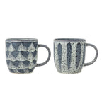 Modern grey ceramic mugs arranged for product display