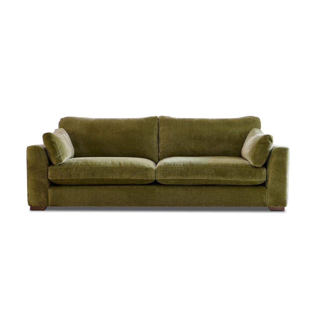 Dougie Grand Sofa in an olive green with two matching throw pillows, shown from a straight-on perspective against a plain white background.