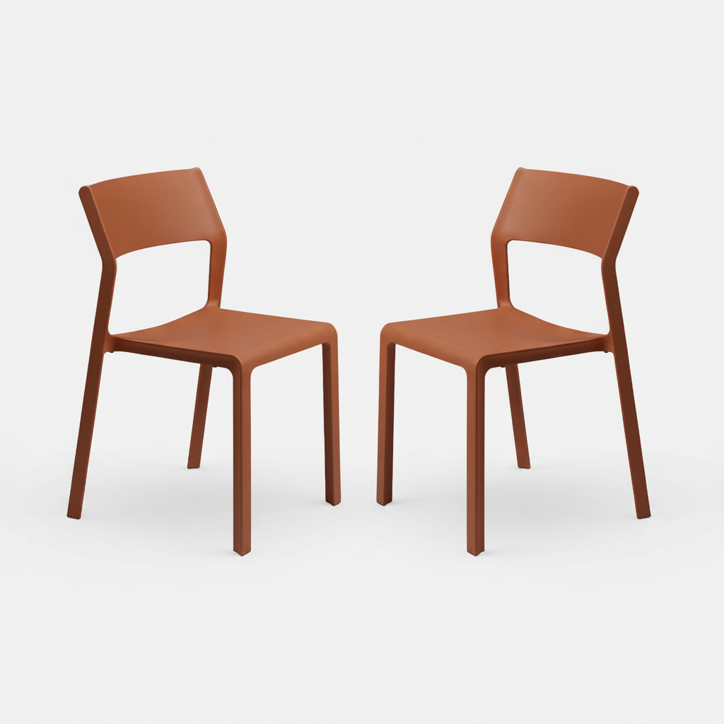 Two mattone colour trill chairs on a white background