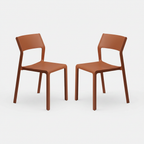 Two mattone colour trill chairs on a white background