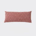 Rectangular red Maximo outdoor sofa cushion on a light grey background