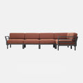 Outdoor corner sofa with Capella red fabric cushions and recycled frame on a white background