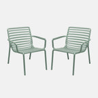 Two light mint green doga relax chairs on a white background