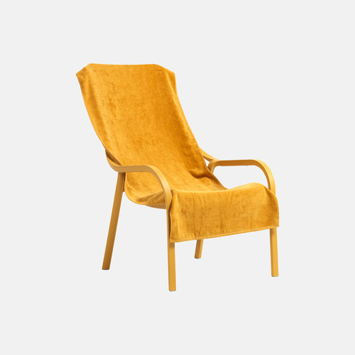 Yellow net lounge with a matching towel on a white background