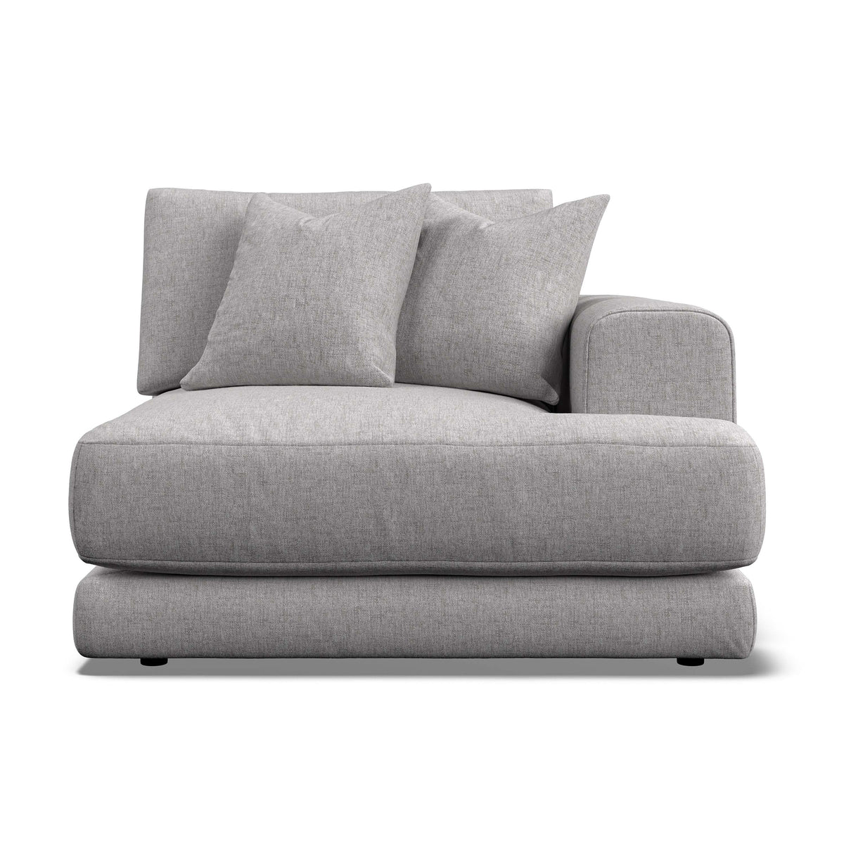 A modern light gray upholstered armchair with a low, chunky base and two matching back cushions, shown on a plain white background.