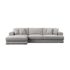 A modern light gray fabric sectional sofa with a left-facing chaise lounge and multiple matching throw pillows, shown against a plain white - background.