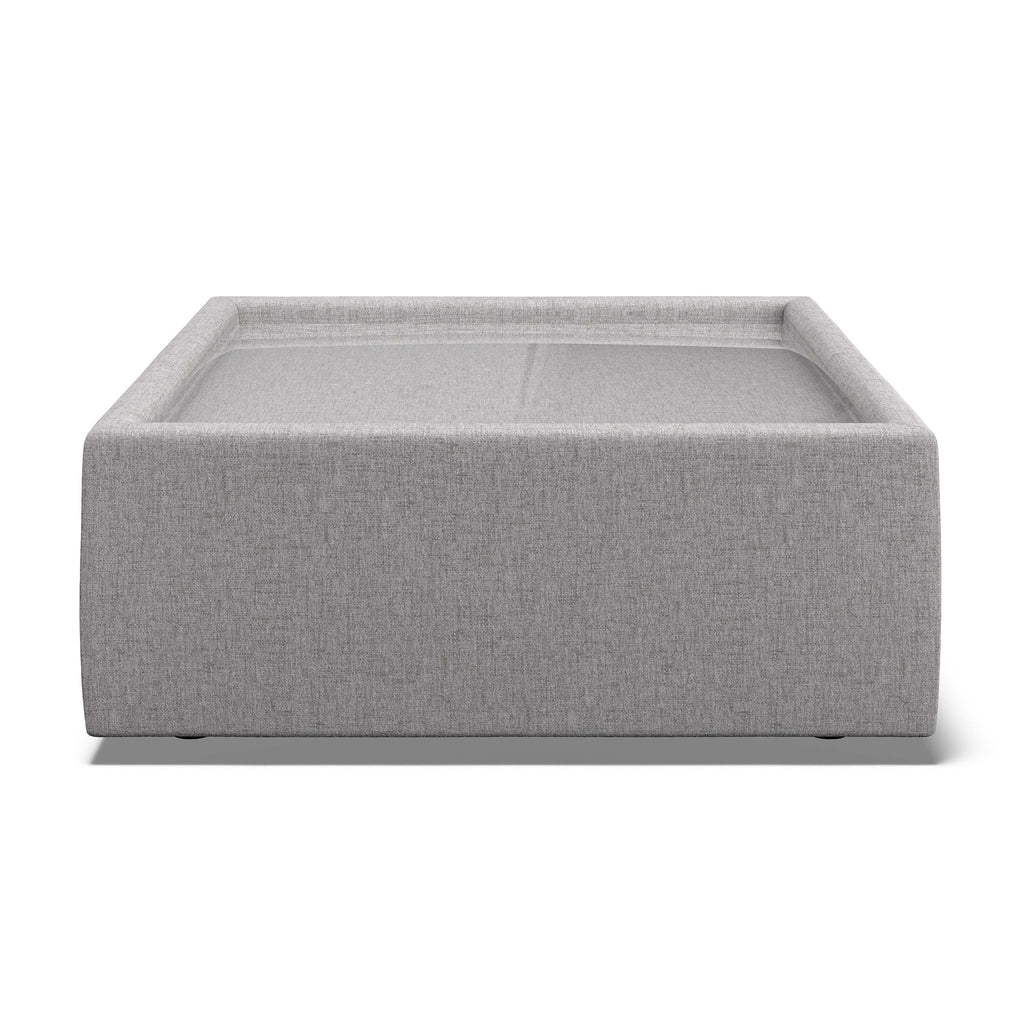 A square, low-profile bench upholstered in light gray textured fabric, shown from a front-facing perspective on a clean white background.
