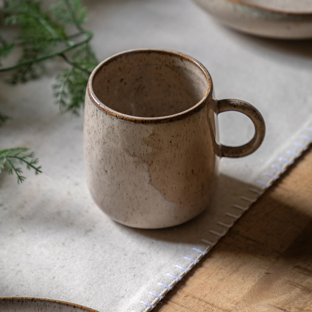 White ceramic oatmeal mug with minimalist modern design