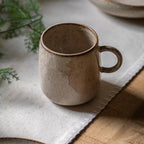 White ceramic oatmeal mug with minimalist modern design