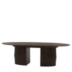 Oval table with wavy base design on a white background