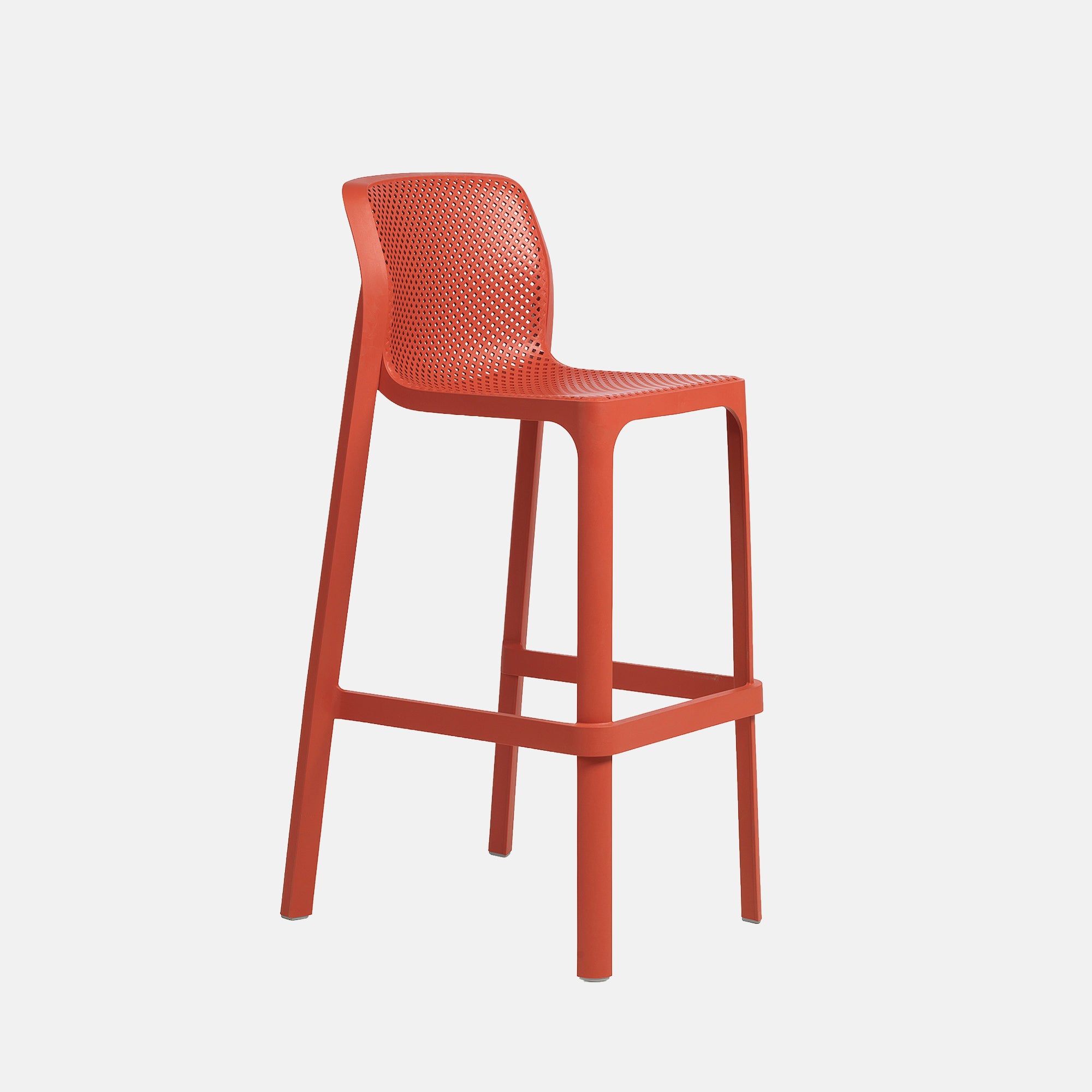 Red bar stool with a perforated design on a white background