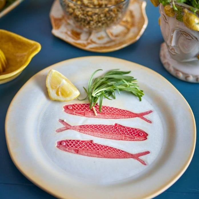 Red fish plate with detailed scales and artistic finish