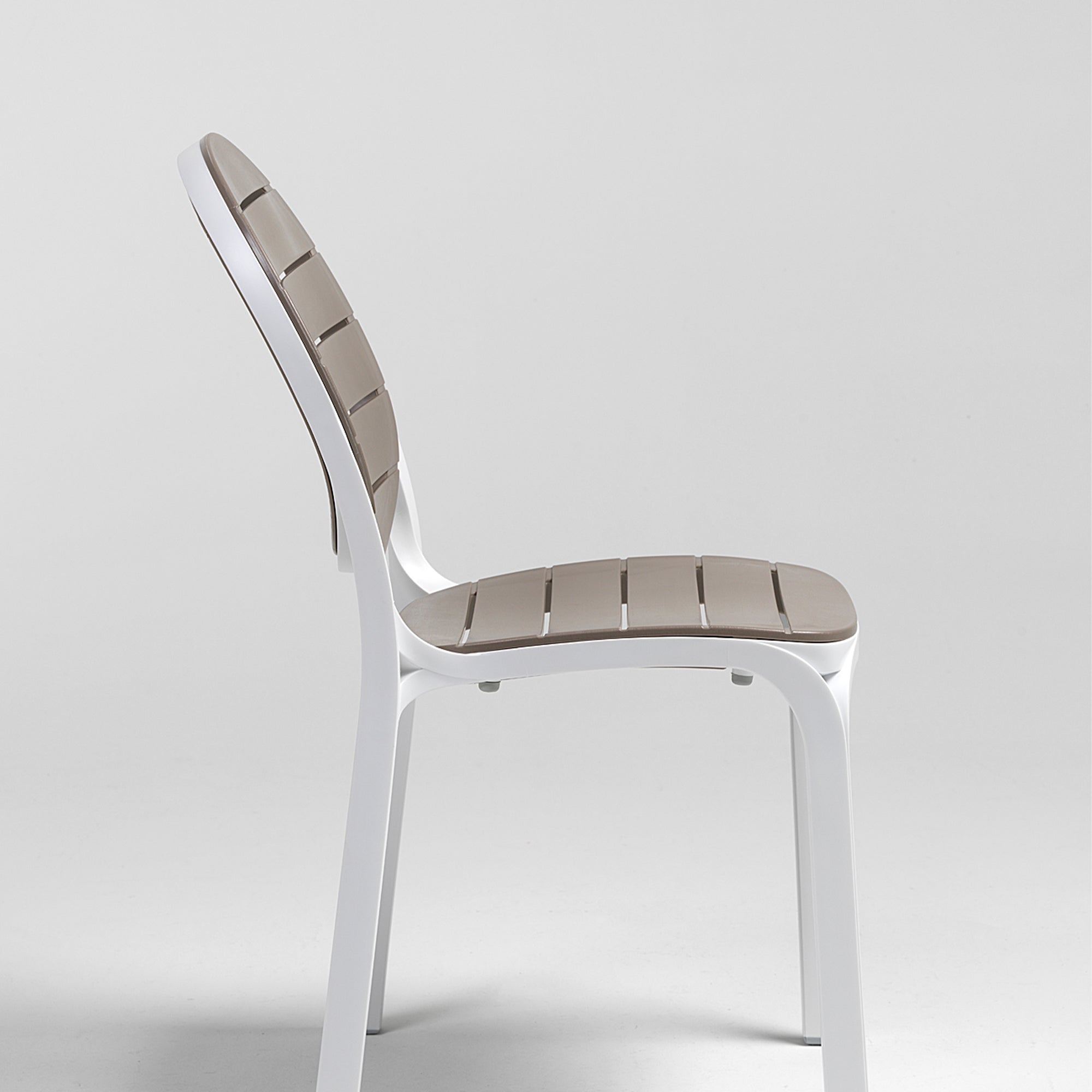 Chair with white frame and brown wooden seat and backrest on a light grey background