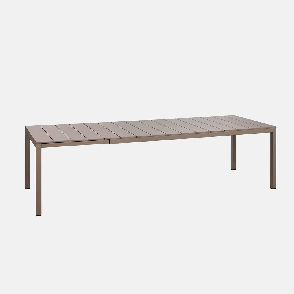 Rio alu 210 extending garden use dining table on a plain backdrop.