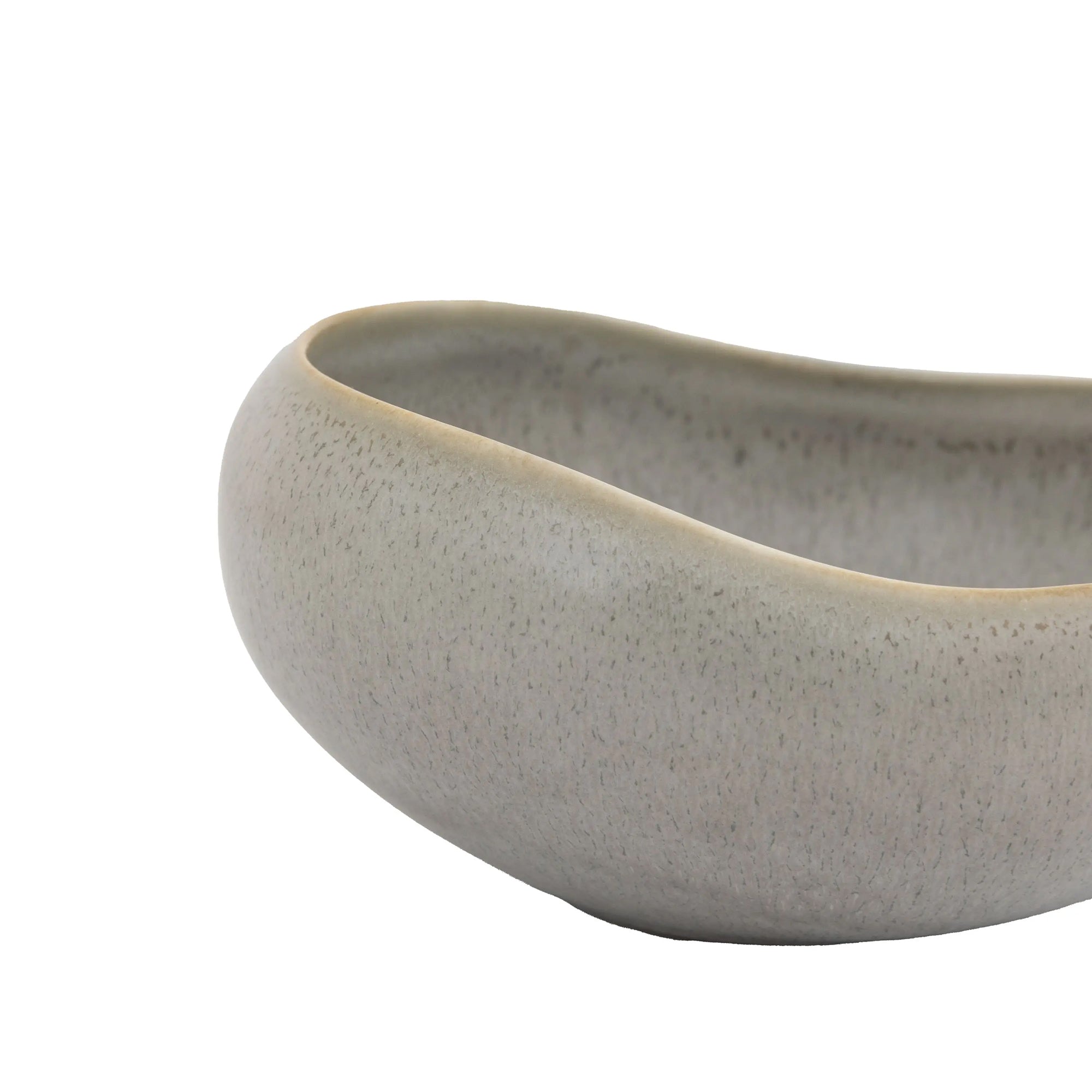 Close-up of textured pebble glaze bowl in stone finish