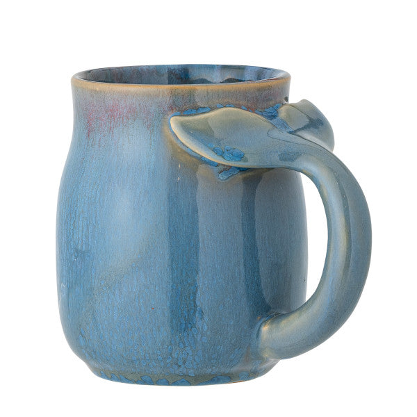Deep blue mug used for coffee or tea
