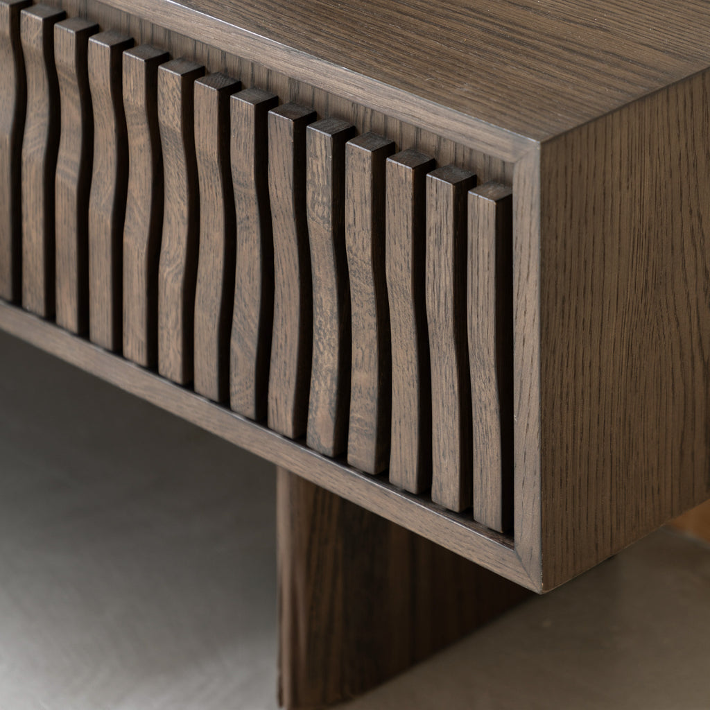 TV Unit with wavy slat design on a neutral background