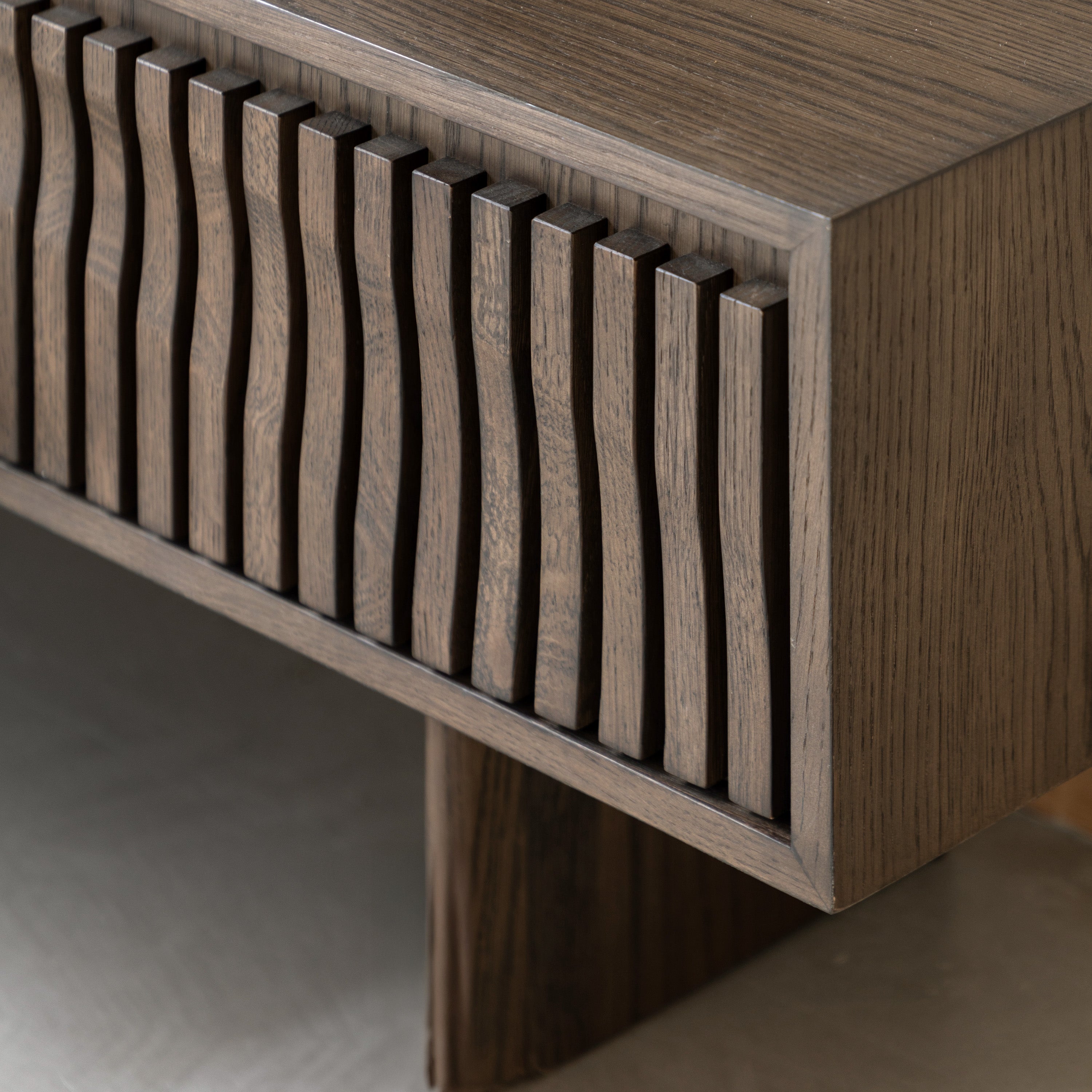 TV Unit with wavy slat design on a neutral background