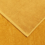 The telo mare towel by Nardi outdoor comes in 3 colours including Mustard yellow. 149329.65.650
