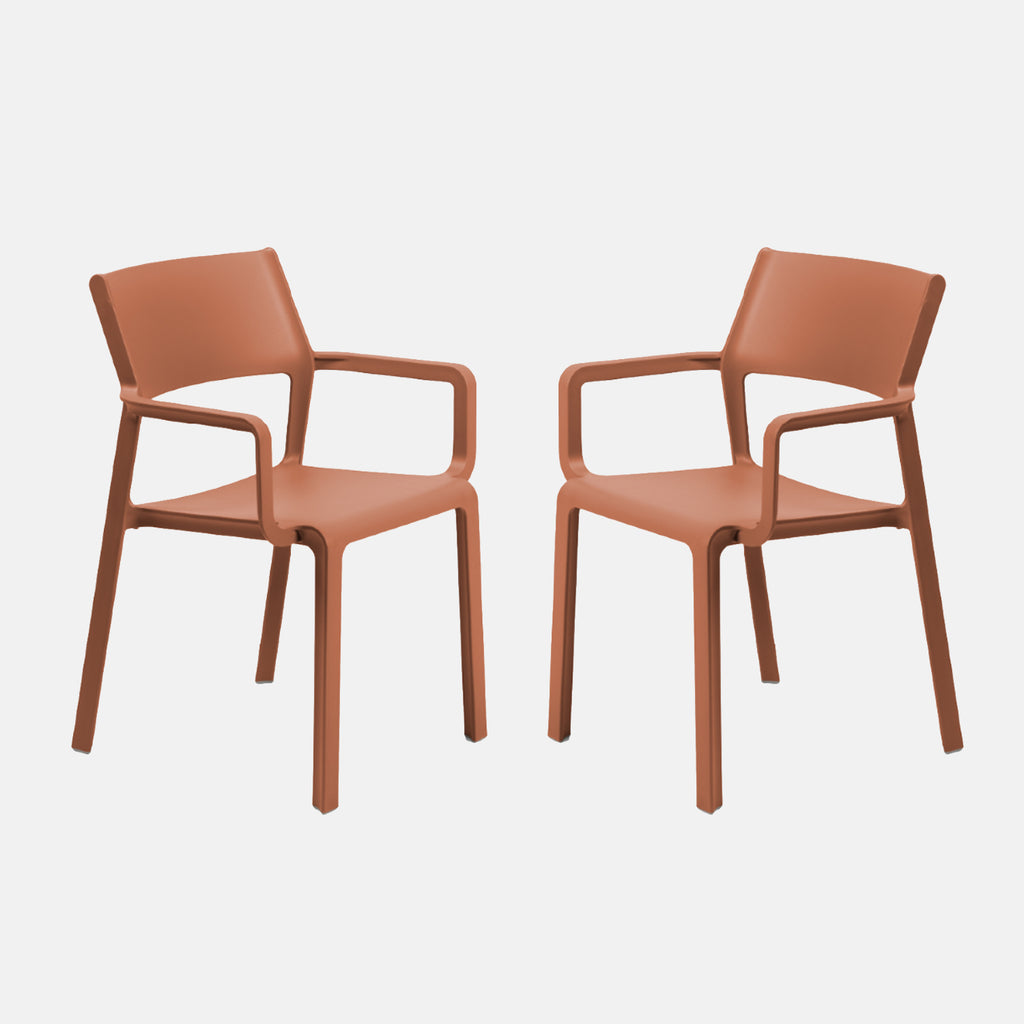 Two mattone brown trill armchairs on a white background