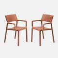Two mattone brown trill armchairs on a white background