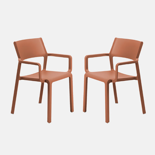 Two mattone brown trill armchairs on a white background