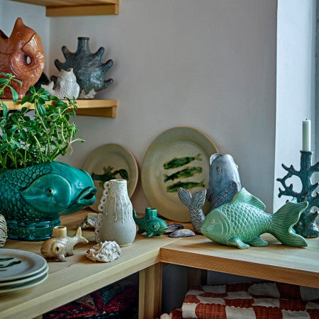 Bold and quirky fish shaped candle holder in vibrant colours, perfect for brightening up any space