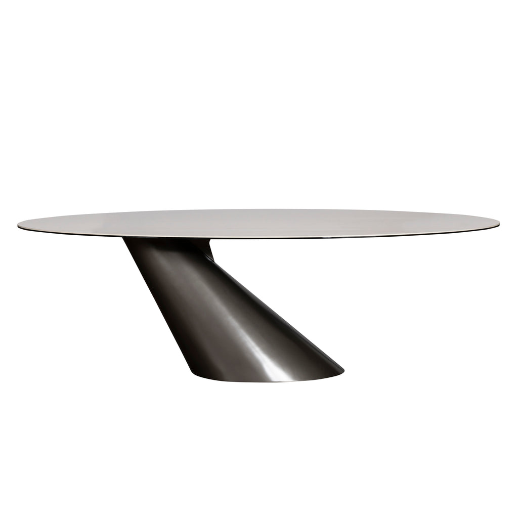 Modern dining table with a white ceramic top and black base on a white background