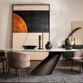 Modern dining room with a stylish table and chairs.