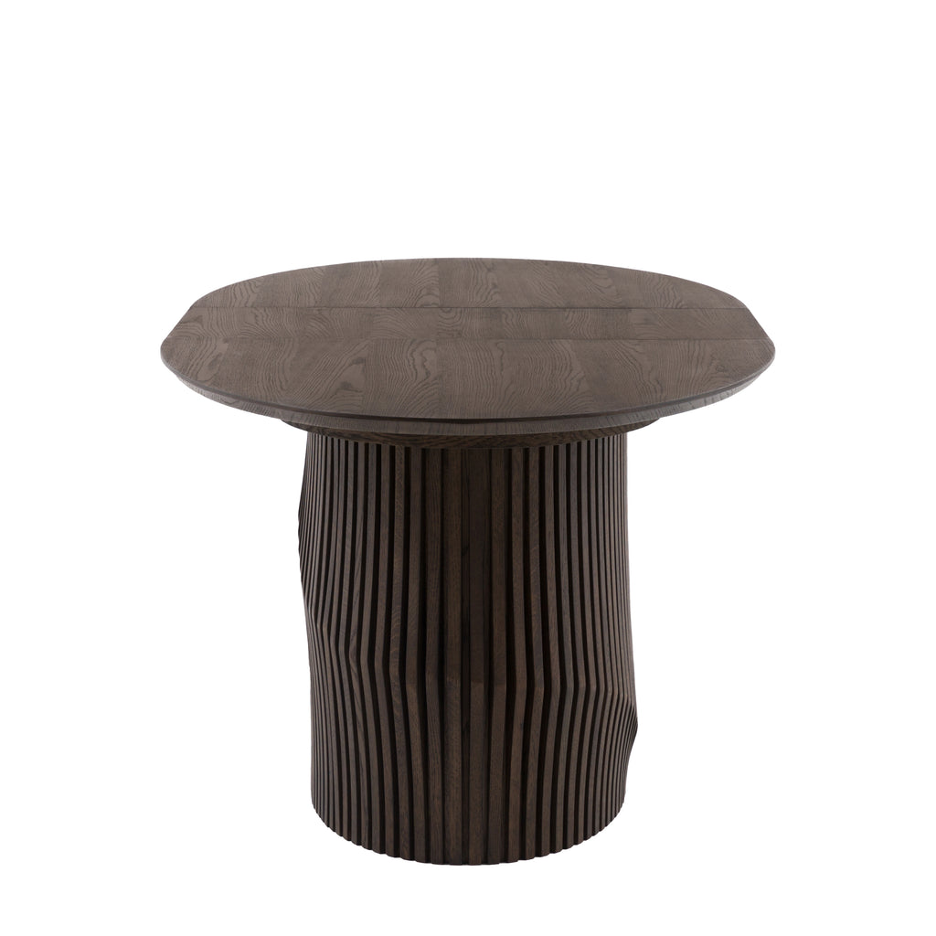 oval Dining table with ribbed cylindrical base on a white background