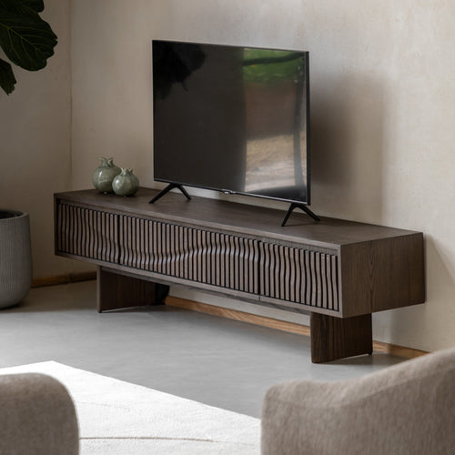 Modern TV stand with a television in a living room setting