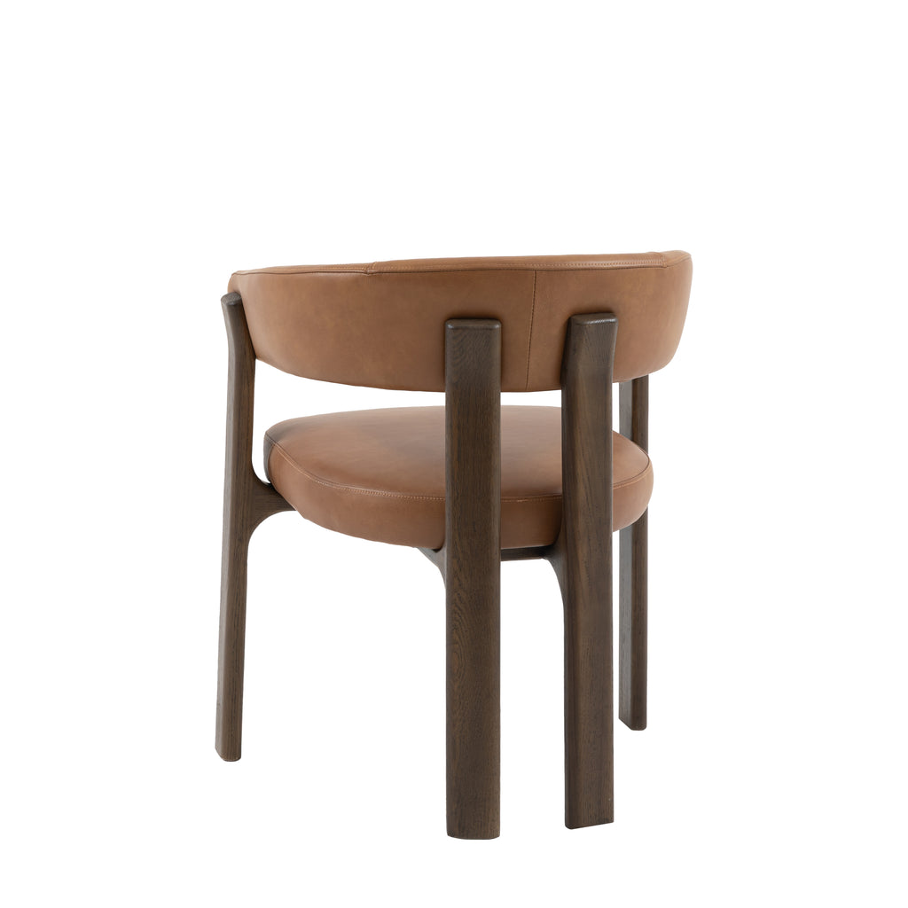 Brown leather chair with wooden legs on a white background