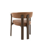 Brown leather chair with wooden legs on a white background