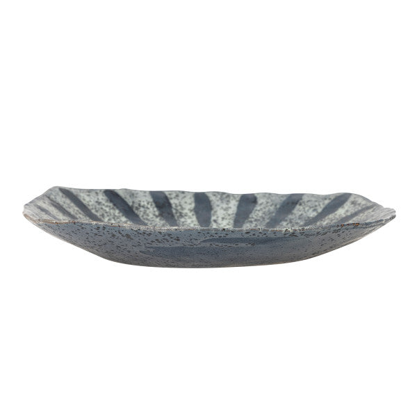 Handmade stoneware plates with organic shape and finish