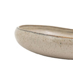 White ceramic bowl with smooth glazed finish