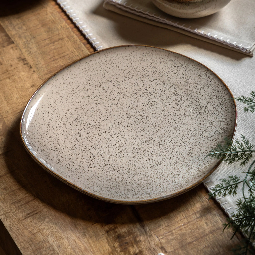 White ceramic oatmeal dinner plate on modern dining table