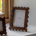 Display your favourite memories with a 7x5 wooden photo frame